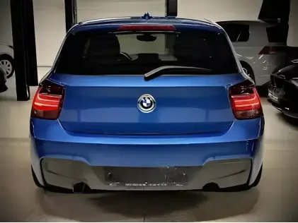 BMW 118i Benzine – Luxe & Comfort met Opendak en Navi!